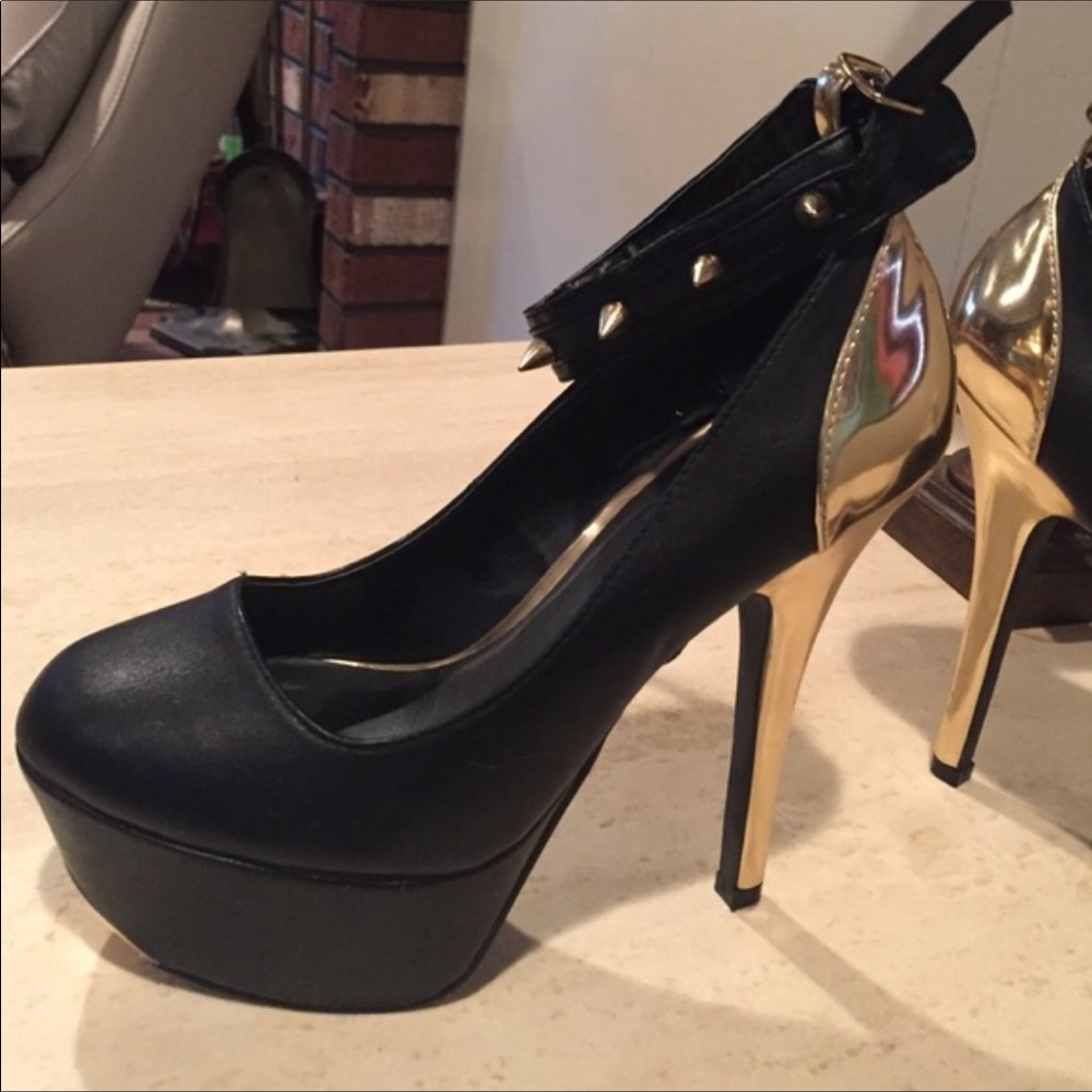 Black and gold platform heels with spiked strap